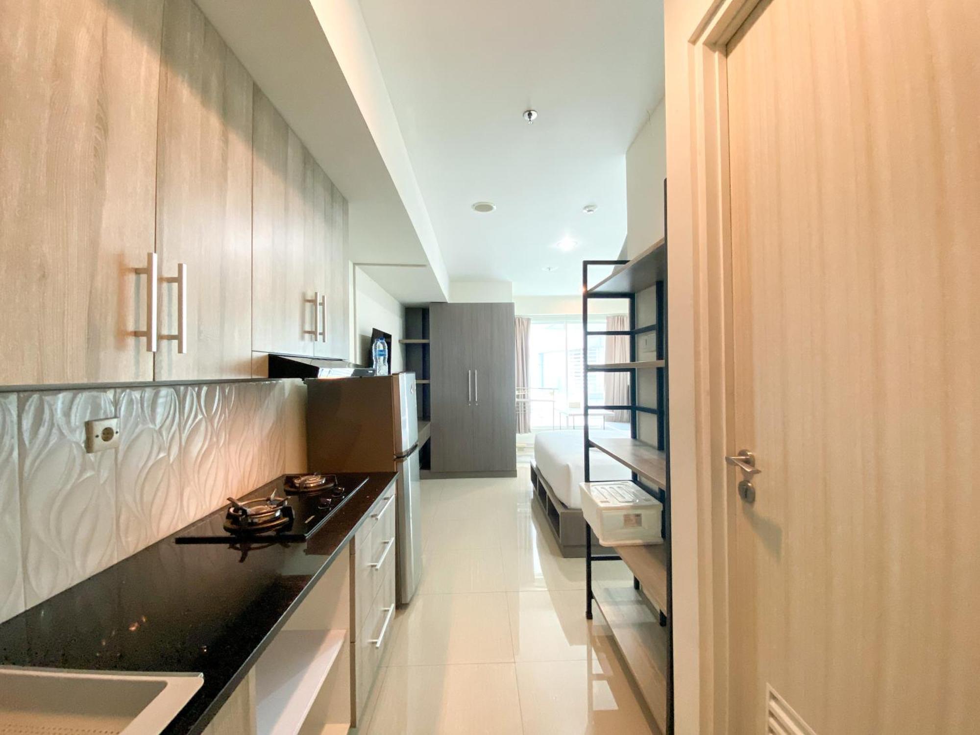 Apartemen Enjoy Living At High Floor Grand Kamala Lagoon By Travelio